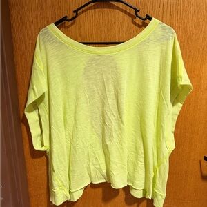 Bright yellow free people workout top with open back